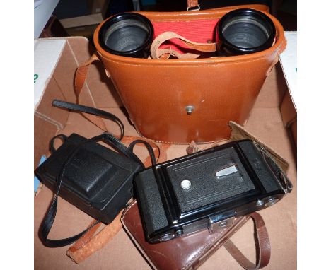 Cased set of Zenith 7 x 50 binoculars, a Ziess Ikon camera and one other 