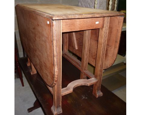 Light oak drop leaf gate leg table 