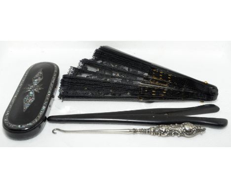 Fan, pair of ebony glove stretchers, ebony box with mother of pearl inlay and button hook