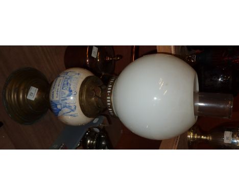 Paraffin lamp with ceramic reservoir with blue & white transfer painted detail 'Solon Caddy's Fine Groceries & Wines Company'