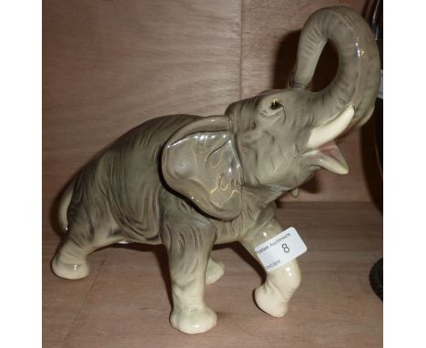 Large ceramic elephant with impressed marks to base 2217