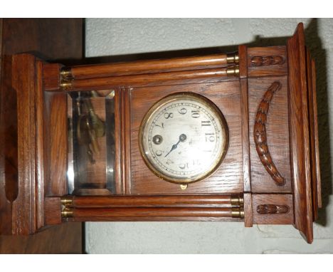 Small oak cased mantel clock 