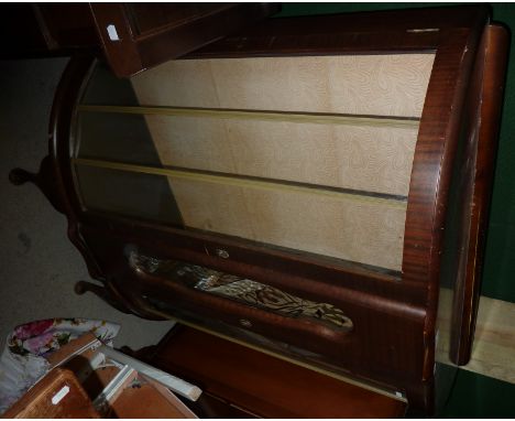 Bow front China cabinet enclosed by two glazed doors 