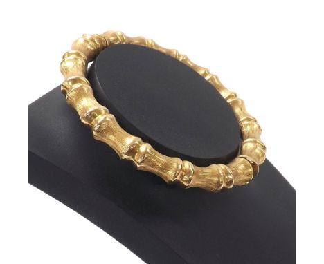 Yellow metal bamboo design hinged bangle, 17.7gm