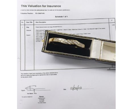 Good contemporary 18ct gold and diamond set oval hinged bangle, set with ninety graduated baguette-cut diamonds within a chan