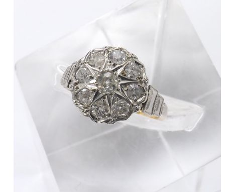 18ct and platinum nine stone diamond cluster ring, 3.8gm, 12mm diameter, ring size M/N