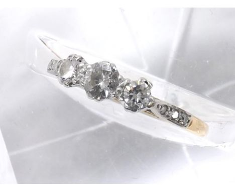 18ct and platinum three stone diamond ring with set shoulders, 0.40ct approx, clarity SI1/2, colour H/I, 2.3gm, ring size N/O