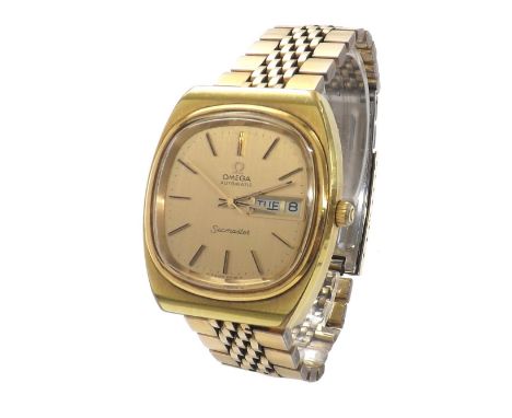 Omega Seamaster automatic gold plated and stainless steel gentleman's bracelet watch, champagne dial with baton markers, day/