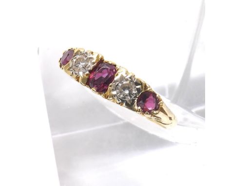 18ct ruby and diamond five stone ring, claw and scroll set consisting of three rubies estimated 1ct approx, alternating with 