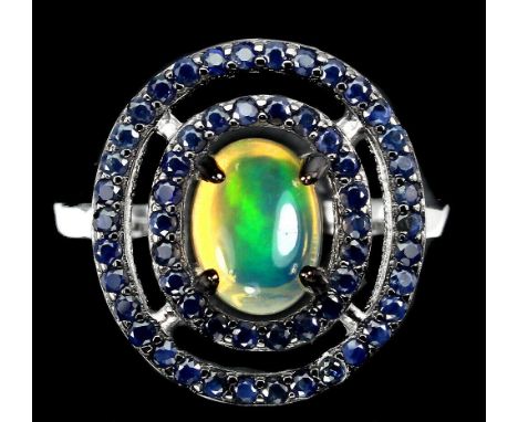 A matching 925 silver cluster ring set with a cabochon cut opal and sapphires, (O).