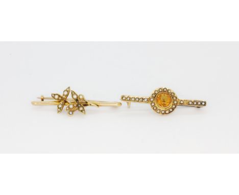 An antique 15ct gold brooch set with seed pearls together with a hallmarked 9ct gold brooch set with a round cut citrine and 
