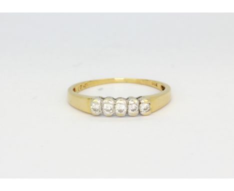 An 18ct yellow and white gold ring set with five brilliant cut diamonds, (P).