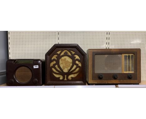 A vintage bakelite radio with a wooden cased speaker and a further GEC radio.