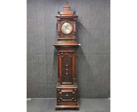 A superb rare 19th century mahogany silvered brass dial striking clock above a polyphon, H. 234. Clock currently missing pend