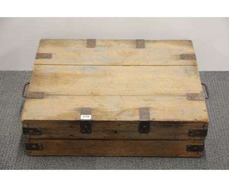 A metal bound pine trunk, 69 x 53 x 21cm.