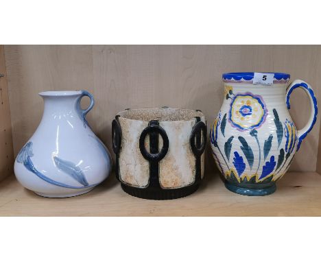 A Crown Ducal hand painted large jug, H. 25cm. together with an Art Nouveau planter and a German glazed pottery jug.