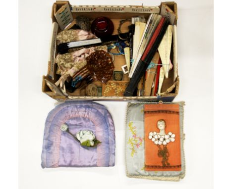 A quantity of vintage fans and other items.