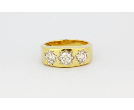 A gentleman's 9ct yellow gold (stamped 9k) ring set with three brilliant cut diamonds, (R.5), approx. 6.5gr.