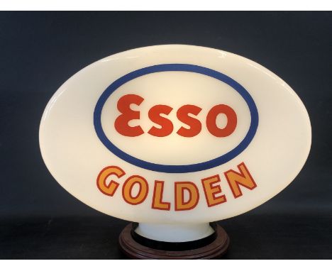 An Esso Golden glass petrol pump globe of excellent bright colour by Hailware, one minor nick to neck otherwise excellent. 