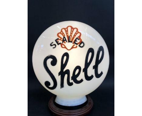 A rare Sealed Shell pill shaped glass petrol pump globe by Chance Brothers, fully stamped underneath, repaired chip to neck o