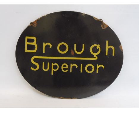 A Brough Superior oval double sided enamel sign on a hanging chain, 14 1/2 x 11 3/4".