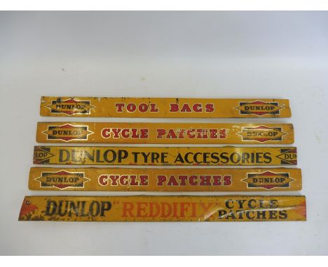Five assorted Dunlop shelf strips.