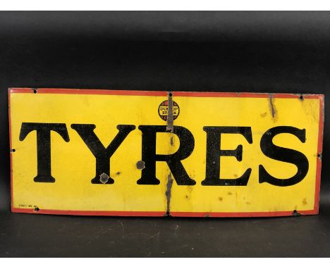 A Dunlop Stock 'Tyres' rectangular enamel sign, dated 1930, 29 x 11 1/2".