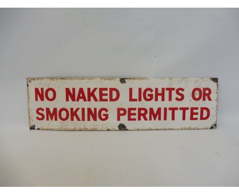 A garage forecourt enamel sign restricting the use of naked lights or smoking, 22 x 6".