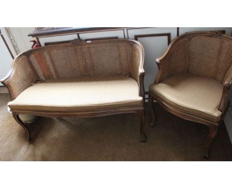 A Edwardian style bergere two seater sofa with armchair Condition: condition good to frame and cane, not that old, possibly 2