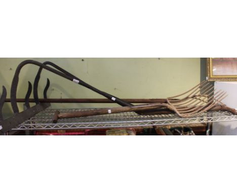 Three old garden farming implements, pitchfork, pull harrow and multi prong fork