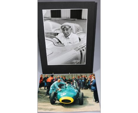 A collection of vintage motor sport professional photographs, including Sterling Moss