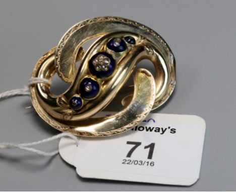 A mid Victorian enamel and diamond brooch, of open twist design, the centre set with five graduated enamel and rose diamond b