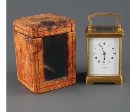 An early 20th century gilt brass four glass carriage timepiece, the enamel Roman dial named Goldsmiths and Silversmith Co. Lt