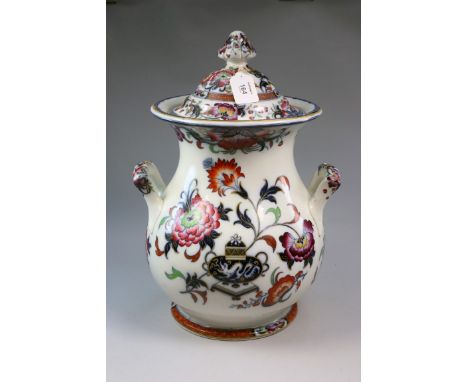 A 19th century English Ironstone baluster twin handled covered jar, of large proportions, polychrome enamel decorated in the 