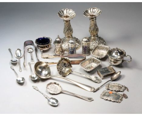 Collingwood and Co, a silver rat tail sauce ladle, London 1910, a silver three piece condiment, a pair of dwarf silver candle