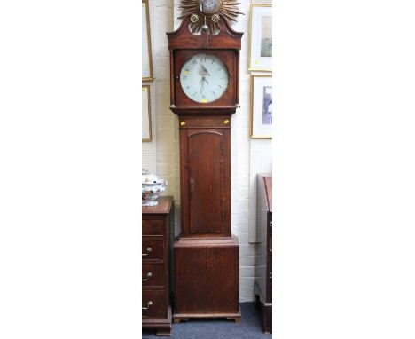 An early 19th century oak and mahogany thirty-hour longcase clock, with scroll pediment, fitted a circular enamel dial, marke