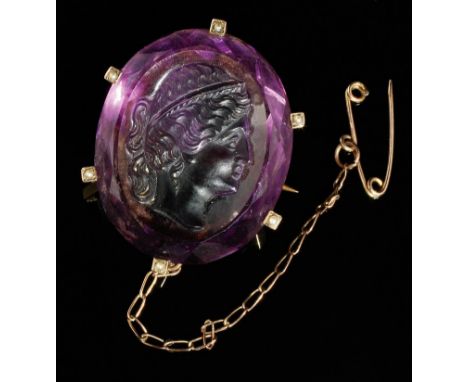 A Victorian amethyst intaglio brooch, the oval brooch carved with a classical bust portrait, concealed frame supporting seed 