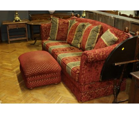 A Harrods' deep seated knole sofa, with wine upholstery and turned wood pommels