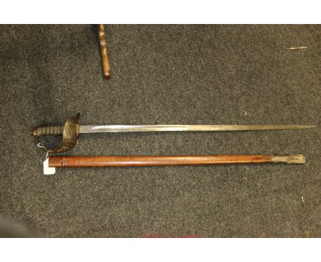 An 1895 pattern infantry officer's sword and scabbard, with engraved blade and ray skin grip, 82 cm (32 1/4 in) long