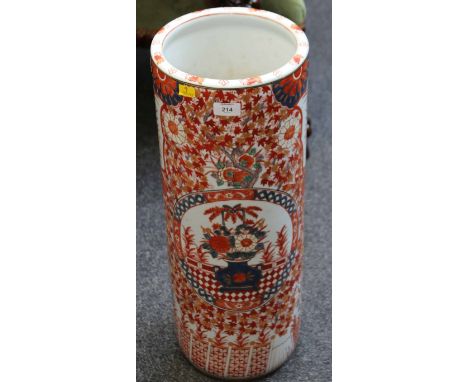 A late 19th century/early 20th century Japanese porcelain stick stand, of cylindrical form, decorated in the Imari palette wi