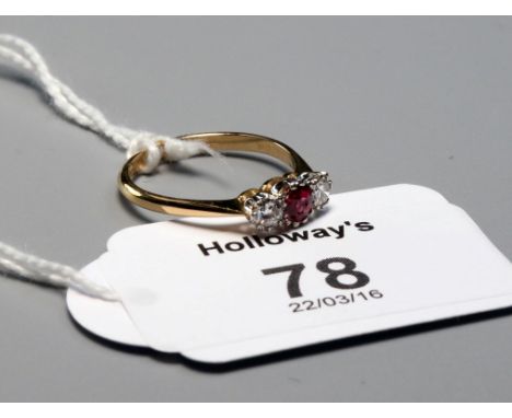 A ruby and diamond graduated half hoop ring, the central oval cut ruby flanked with brilliant cut diamonds, all claw mounted 