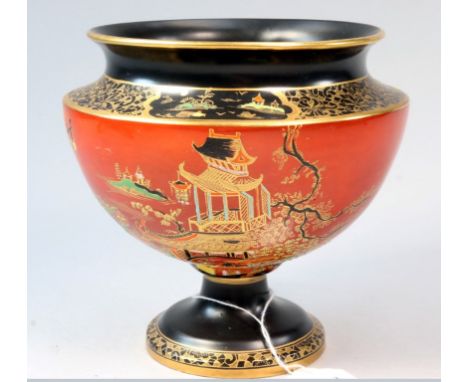 A 1920s Carltonware 'Temple' pattern stemmed bowl, with a burnt orange ground, 15cm