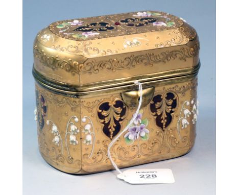 A late 19th century Bohemian, Moser ruby and gilded glass casket, decorated with cut-away trefoil floral reserves and applied