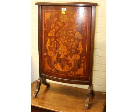 An Edwardian bow fronted mahogany and marquetry firescreen, with stile supports, 54cm wide