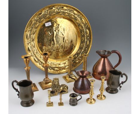 A selection of assorted metalware items including; brass column candle sticks of assorted sizes, brass lion figure, pewter ta