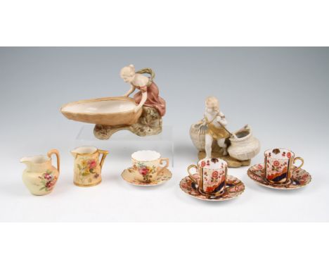 A lot to include early 20th Century Royal Dux female figure with shell dish, Royal Vienna figure of a child carrying two bask