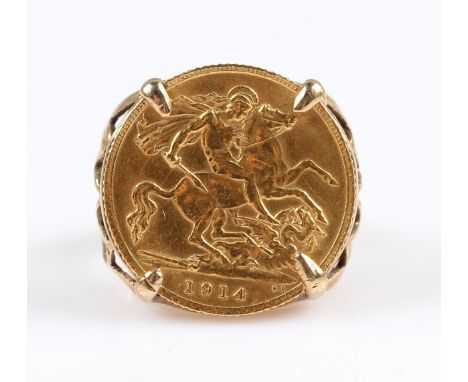 A 9ct yellow gold sovereign ring, set with a 1914 George V full sovereign, mounted in open metalwork shoulders, stamped 9ct g