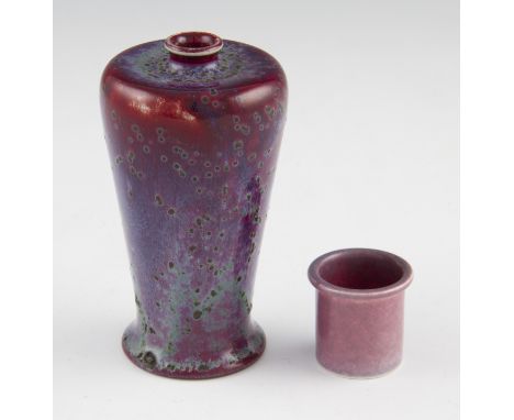 A Ruskin Pottery high fired vase of tapered shouldered form with green speckled tonal mauve, lilac and sang de boeuf flambe g