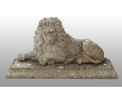 A rectangular concrete garden bench with scroll design embossed base ends, length 100com, together with a concrete garden lio