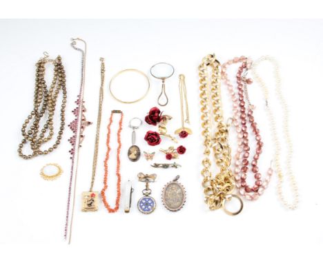 A lot of costume jewellery to include a coral necklace, a white metal mother of pearl pen knife, a yellow metal bow pin brooc